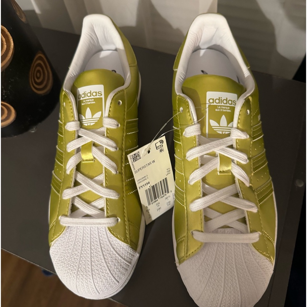 Gold & white brand new never worn adidas